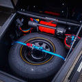 Trailer Hire Brisbane - Tire and winch setup inside a vehicle's open cargo area