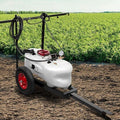Farm sprayer on a field with green crops in the background - 100L Weed Spray/Fertiliser Trailer
