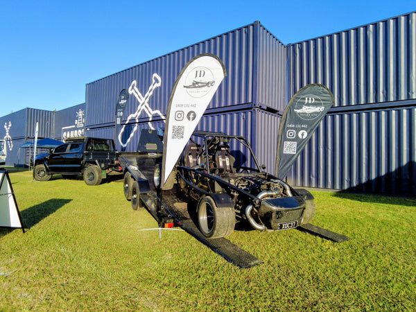 Drift car being strapped down on JD Trailer Hire car trailer hire